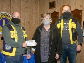 The Exeter Lions Club recently made a $1,000 donation to the Huron County Food Bank Distribution Centre. From left are Lions president Mark Keller, Food Bank Distribution Centre executive director Mary Ellen Zielman and Lions secretary Jeff MacLean. Scott Nixon