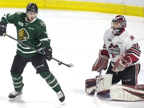 London Knights forward Connor McMichael tips the puck but can't get it past Guelph Storm goalie Nico Daws in the third period of their OHL playoff game in London on Sunday April 7, 2019. (Derek Ruttan/The London Free Press)