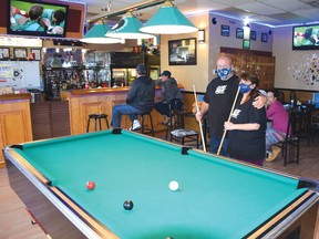 Photo by KEVIN McSHEFFREY/THE STANDARD
Darin and Joanna Moggy are proud of their new business, the Clean Break Bar that they opened in September. They also have two pool leagues that play every week.
