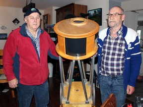 Randy Currie, left, and Bill Montague are hoping for clear skies Monday so they can be witness to a great conjunction with Jupiter and Saturn.
PJ Wilson/The Nugget