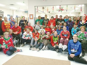 Nipawin Handi-works, pictured in their Christmas sweater group photo from 2019, was one of five organizations in the North East to benefit from a SaskTel employee giving program. File Photo.