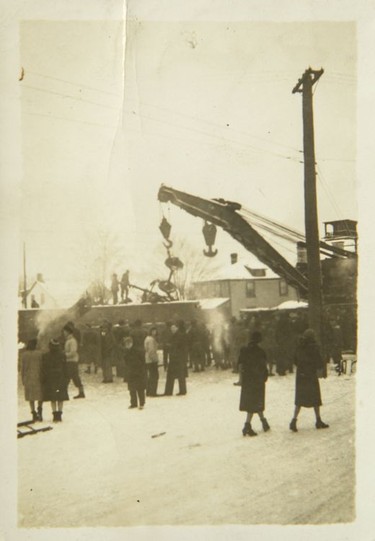 Workers clear the wreckage of the Almonte train wreck, December 1942.