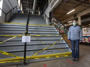 The Western Fair Market has closed its upper floor that includes non-essential vendors. Food vendor Edna Lorimer said, "It's unfair that we had to close unessentials upstairs while big box stores have non-essentials and they can stay open." Mike Hensen/Postmedia Network