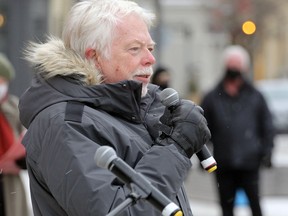 Mike Sullivan addresses a crowd of demonstrators at Market Square last month opposing the proposed Xinyi glass factory planned for the city's southwest corner.
Cory Smith/The Beacon Herald