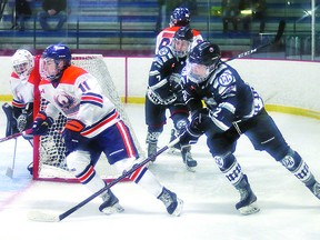 Tyson Doucette of the Soo Thunderbirds skates ahead of Ben Anderson of the Espanola Express during recent NOJHL action at the Espanola Regional Recreation Complex. CHELSEA SOLOMON