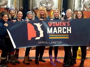 Member's of the Women's March Sarnia-Lambton executive pose in January 2020 after the march in Sarnia. The chapter is holding a Holiday Helpers donation drive until Dec. 20. Pictured, from left, are Meghan Reale, Jaime McCabe-Wyville, Sarah Sowinski, Angela Salaris, Ronee Capes, Shona Smith, Stefanie Bunko, and Lila Palychuk. (Submitted)