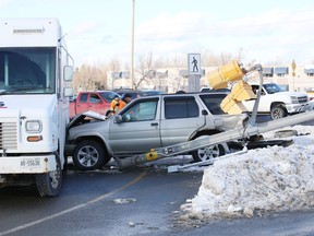 Greater Sudbury Police and the fire department attended the scene of a multi-vehicle collision on the Kingsway at Second Avenue in Sudbury, Ont. on Monday December 14, 2020. A traffic light pole was hit and knocked down in the collision. A tweet from police said there were no reported injuries.