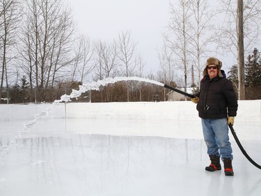 Joe Caridade floods the rink at Robinson Playground in Sudbury, Ont. on Wednesday December 16, 2020. Caridade has been taking care of the ice surface at the playground for more than 35 years. John Lappa/Sudbury Star/Postmedia Network