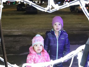 Harper and Avery Phillips check out the Sudbury Charities Foundation Festival of Lights at Science North in Sudbury, Ont. The festival opens daily at Science North's parking lot, starting at 5 p.m.