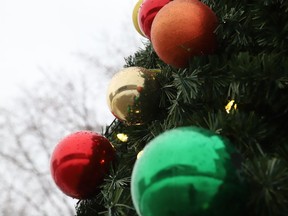Ornaments and lights adorn a Christmas tree located at the courtyard at Tom Davies Square.