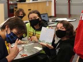 Plan A Sudbury collaborated with more than 20 schools in the community to make and deliver handmade Christmas cards to long-term care residents throughout December. Here, Ecole secondaire catholique Champlain students help out.