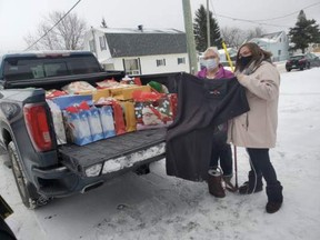 Marlen Smith, left, and Joanne Hagger-Perritt, both members of the local chapter of the Porcupine Kidney Foundation, were out giving Christmas gift bags to dialysis patients at Timmins and District Hospital on Monday. Around 75 gift bags were given at the hospital. 

Supplied