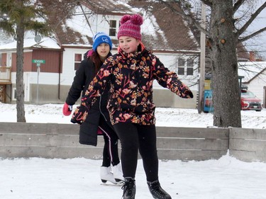Even though people couldn't gather for indoor events amid the COVID-19 pandemic, many still took advantage of outdoor activities available to be enjoyed in Timmins during the Christmas holiday break. Grace Corbett, in the foreground, is seen here skating at the outdoor rink in Roy Nicholson Park with Luciana Fortin.

RICHA BHOSALE/The Daily Press