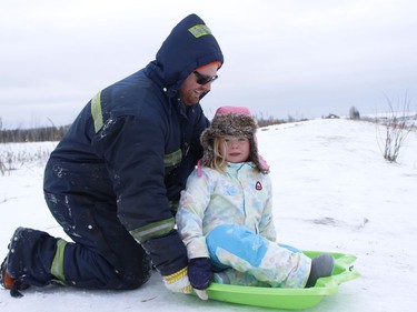 Havana Talaskavich was out with her dad Alex to enjoy the sliding hill just off Highway 655 at the end of Ross Avenue in Timmins during the Christmas holidays.

RICHA BHOSALE/The Daily Press