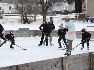 Taking advantage of the mild weather Sunday, a group of youths got together to play some hockey on one of the rinks at Roy Nicholson Park.

RICHA BHOSALE/The Daily Press