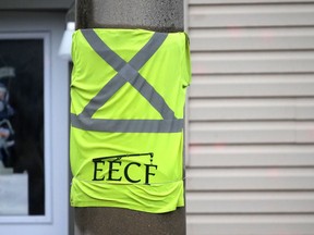 Shirts with EECF (East Elgin Concrete Forming) are being displayed across the region, including this one on Broadway in Tillsonburg, as a tribute to John Martens and Henry Harder who died on Dec. 11, when a four-storey apartment building being built at 555 Teeple Terrace, in west London, partially collapsed on Dec. 11. (Chris Abbott/Norfolk & Tillsonburg News)