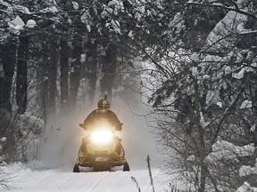 The Ontario Federation of Snowmobile Clubs (OFSC) is urging snowmobilers to avoid travelling outside of their local public health region until the province-wide lockdown ends.
AP File Photo