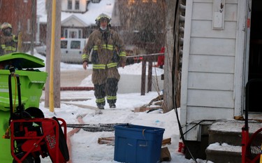 Firefighters respond to blaze at 61 and 65 Wellington St. E., on Saturday, Jan. 30, 2021 in Sault Ste. Marie, Ont. (BRIAN KELLY/THE SAULT STAR/POSTMEDIA NETWORK)