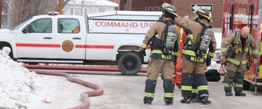 Firefighters respond to blaze at 61 and 65 Wellington St. E., on Saturday, Jan. 30, 2021 in Sault Ste. Marie, Ont. (BRIAN KELLY/THE SAULT STAR/POSTMEDIA NETWORK)