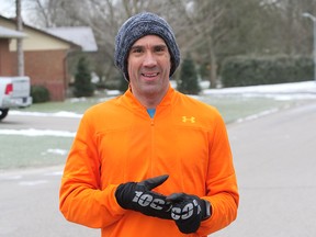 Tillsonburg's George Papadakos takes a short 30-second break during the first 42.2 km marathon on Friday, Jan. 1st. Papadakos plans to run 31 marathons in 31 days raising funds for the Alzheimer Society of Oxford. (Chris Abbott/Norfolk & Tillsonburg News)