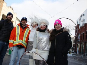 Lochiel Street between Christina and Front streets downtown was shut to traffic, decked out in lights, and open to ideas from the public Feb. 7, 2020 about possible pedestrian streets in Sarnia. Pictured are event organizers with the City of Sarnia Eric Hyatt, left, Corey Saunders, and Rachel Veilleux, right, with buskers Jennifer Wilson, centre, and Colleen Costello, with Dispatch Talent. Tyler Kula/Sarnia Observer/Postmedia Network