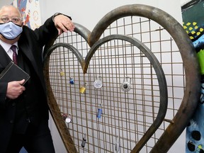 Doug Robbins will officiate at the Love Lock Down event hosted by local wedding professionals at The Co., a gallery and artists' space in Chatham, Ont., on Feb. 12, 2020. Couples can add their love locks to this heart-shaped sculpture after their ceremony. Mark Malone/Chatham Daily News/Postmedia Network