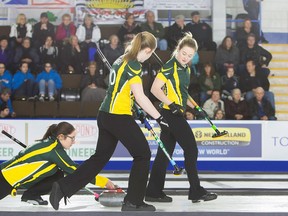 Megan Smith delivers a stone at junior nationals.