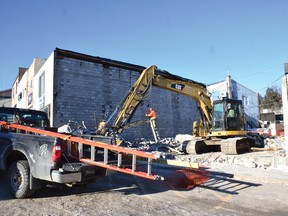 Photo by KEVIN McSHEFFREY/THE STANDARD
Last week, two long-standing buildings in the downtown Elliot Lake at 16 and 18 Phillip Walk, were demolished leaving empty lots. The two structures, the former Knights of Columbus Hall and Woodland Printers, were in a state of disrepair and were demolished by Wendell Farquhar Trucking of Elliot Lake.