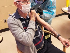 Tavistock’s Earl Morrison, a resident at PeopleCare, received his first-dose of the Pfizer-BioNTech COVID-19 vaccination at the home on Tuesday. Morrison was one of the first long-term care home residents in the Southwestern public health region to receive the vaccine. (Courtesy of PeopleCare Tavistock)
