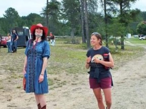 Elizabeth Cassidy and liver donor Stacey Wagler attend a horse show in Massey last summer. SUBMITTED