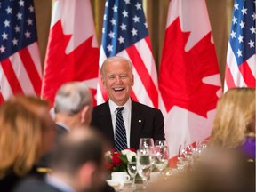 Files: Then-vice-president Joe Biden has a laugh listening to Prime Minister Justin Trudeau during a state dinner in Ottawa in 2016.