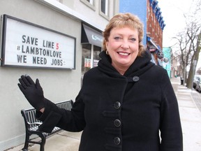 Sarnia-Lambton MP Marilyn Gladu stands near a sign in downtown Sarnia supporting the Line 5 pipeline that helps supply local refineries and chemical plants. Michigan's governor is trying to shut down the pipeline's crossing at the Straits of Mackinac.