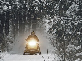 The North Bay Parry Sound District Health Unit has ordered the closing of all Ontario Federation of Snowmobile Clubs' (OFC) trails and trails using Crown land in the health unit district starting Thursday. 
AP File Photo