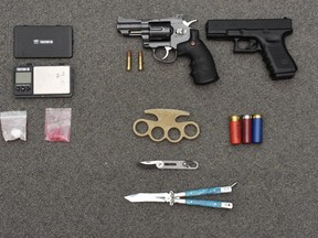 Strathroy-Caradoc police seized a sawed-off shotgun, replica pistol, ammunition, fentanyl, methamphetamine and cash during a search of a home on Head Street North on Jan. 8. Handout