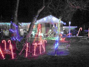 The light show at 7 William Street, Tillsonburg is timed to 50 songs you can listen to on 106.5 FM, most of the programmed into the Light-o-Rama system by Jennifer Bakker. They will remain up for the duration of the lockdown in support of frontline workers. (Chris Abbott/Norfolk and Tillsonburg News)