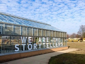 CK Public Health and Lambton Kent District School Board have partnered to work on a public art project at John McGregor Secondary School called We Are the Storytellers. The organizers of the project engaged students at the high school to learn about their thoughts on the COVID-19 pandemic. Their responses were then put on the windows of this greenhouse building in vinyl lettering. (Handout/Postmedia Network)