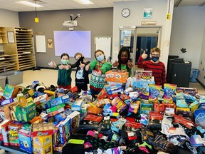 Grade 5 students at Southpointe School in Fort Saskatchewan compiled donations of snacks and socks as part of their "SNOCKS" inititative-- an effort to teach students about poverty by giving back to their community. Photo Supplied by Carole Bossert