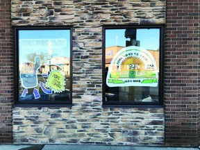 Businesses participate in a window decorating contest as part of a Calmar Homecoming contest. (Supplied)
