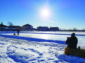 In conjunction with Leduc County, the New Sarepta Family Enrichment Association planned and organized the installation of a community outdoor rink in New Sarepta. On Saturday, Jan. 9 the community came together to shovel snow, prep the site and flood the liner. It is now open for the public to enjoy. (Supplied)