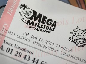 Mega Millions lottery tickets are sold at a 7-Eleven store in the Loop on January 22, 2021 in Chicago, Illinois. GETTY IMAGES