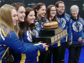 Jan Pula, right, with the championship-winning Laurentian women's curling team.