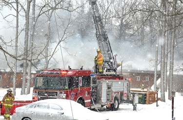 Perth East firefighters fought through the wind and snow to battle a fire at the Forest Motel in Perth East, just past Stratford’s eastern boundary Tuesday morning. Galen Simmons/The Beacon Herald/Postmedia Network