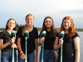 Up-and-coming curlers from Team Toner pose for a photo.