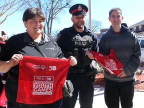 Local Special Olympians Terri Bell, left, and Steven Williams, right, along with Chatham-Kent Police Service Const. Jason Herder, were part of an event held in Chatham in March 2019 to recognize the 50th anniversary of the Special Olympics movement. Herder was formerly recognized by the Chatham Kent Police Services Board recently for his work with Special Olympics. Ellwood Shreve/Postmedia Network