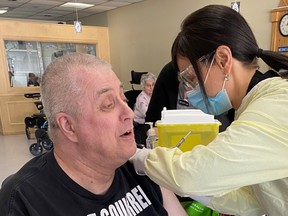 Ontario Finnish Rest Home resident Larry Grekula is Algoma's first recipient of the COVID-19 vaccine Wednesday afternoon. "The vaccine means happiness, I am happy to get it and it is a start for the country to get back to normal … it feels good to be a part of making history,” said Grekula, a resident there since 2006. SUPPLIED