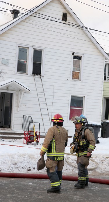 Firefighters respond to blaze at 61 and 65 Wellington St. E., on Saturday, Jan. 30, 2021 in Sault Ste. Marie, Ont. (BRIAN KELLY/THE SAULT STAR/POSTMEDIA NETWORK)