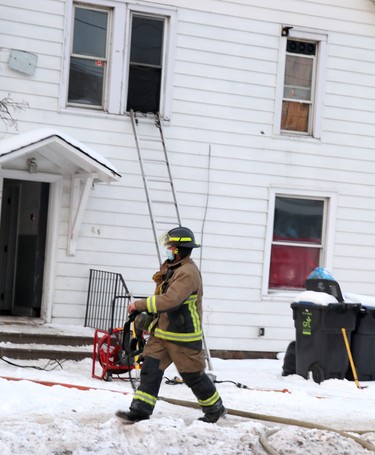 Firefighters respond to blaze at 61 and 65 Wellington St. E., on Saturday, Jan. 30, 2021 in Sault Ste. Marie, Ont. (BRIAN KELLY/THE SAULT STAR/POSTMEDIA NETWORK)