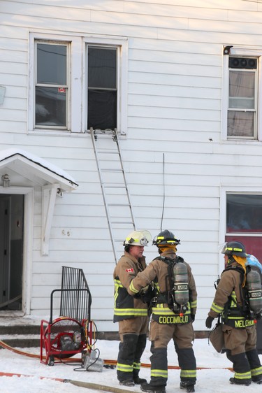 Firefighters respond to blaze at 61 and 65 Wellington St. E., on Saturday, Jan. 30, 2021 in Sault Ste. Marie, Ont. (BRIAN KELLY/THE SAULT STAR/POSTMEDIA NETWORK)