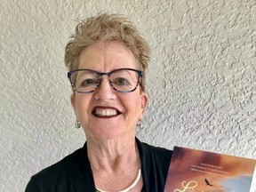 Dresden's Judy Paling with her book, Living Proof: True Stories of One Person's Faith Journey from Wounded to Warrior. Handout