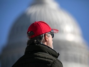 A Trump supporter stands outside the U.S. Capitol on January 07, 2021 in Washington, DC.